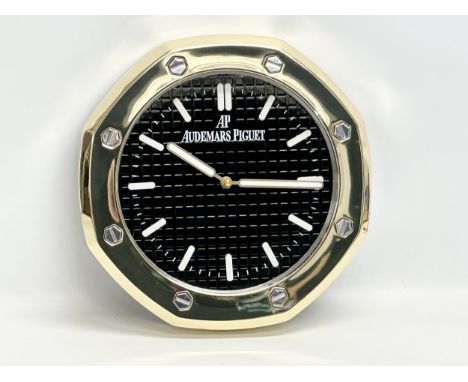 An AP Audemars Piguet advertising wall clock. 34cm