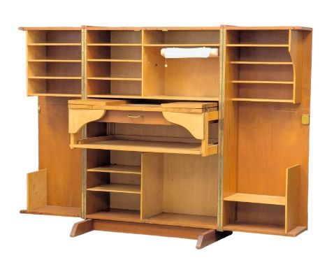 A Mummenthaler and Meier. A Mid Century teak "Magic Box" desk with maple interior. Open measures 164x115cm. Closed 82x54x115c