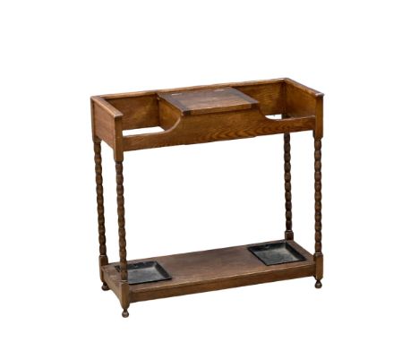 An Early 20th Century oak umbrella stick stand. Circa 1920. 77x32.5x73.5cm