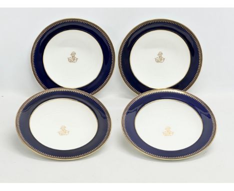 A set of 4 fine quality Late 19th Century Mintons pottery soup bowls. With gilt rims on a cobalt blue and white ground. Sevre