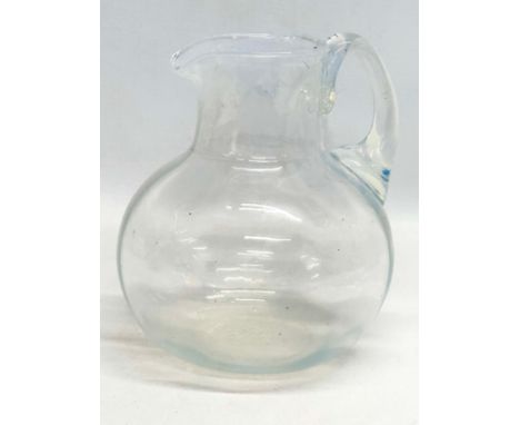 A Late 19th Century opaline glass pitcher/water jug. 16x15x18cm