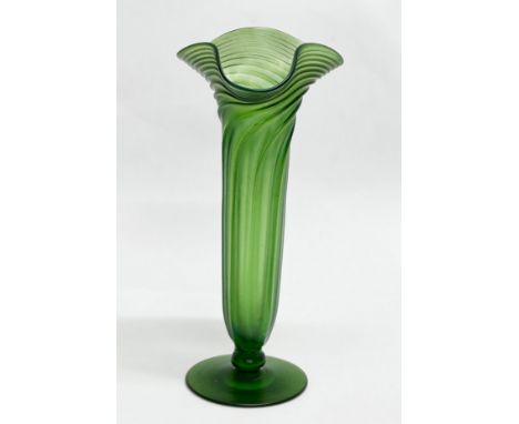 Loetz. An Early 20th Century iridescent wrythen glass vase. Circa 1900. 20cm