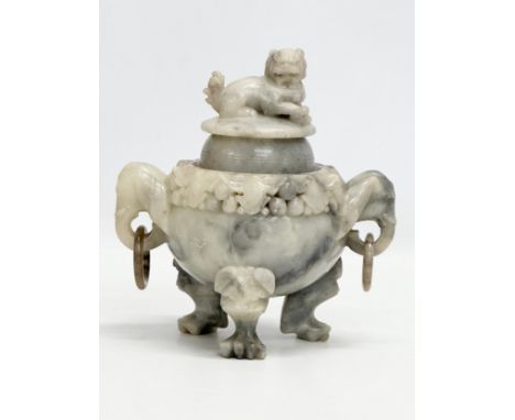 A 19th Century Chinese carved jade, tripod incense burner. With carved Foo Dog cover, elephant ring handles on a reticulated 