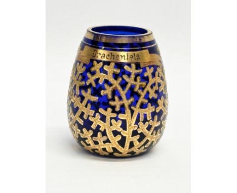 A small Early Century German gilt enamel bound cobalt blue glass vase. Drachenfels. 6x8cm