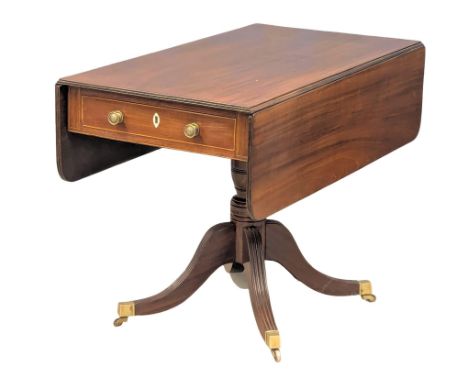 An Early 19th Century George IV mahogany sofa table on pedestal base with 1 drawer and dummy drawer. Circa 1820. Extended 106