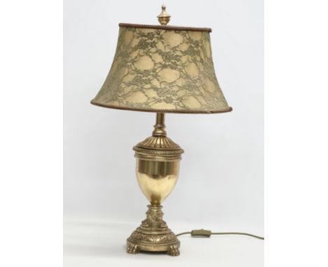 A large brass and gilt resin table lamp. 71cm