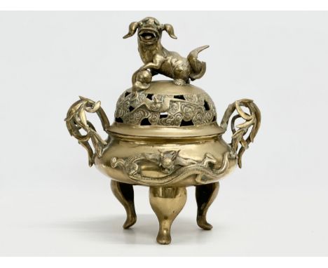 A large 19th Century Chinese, Xuande Revival brass tripod incense burner. Xuande mark. 31x25x34cm