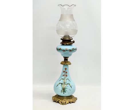 A large 19th Century Bohemian painted opaline glass oil lamp a on gilt brass base. 66cm