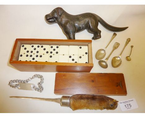 Hallmarked silver spoons, ID bracelet, hunting trophy as an otter's paw handled silver letter opener, cast iron dog nutcracke