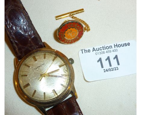 Vintage 1970s 9ct. gold Garrard wrist watch, with engraved inscription under relating to Unigate, together with a long servic