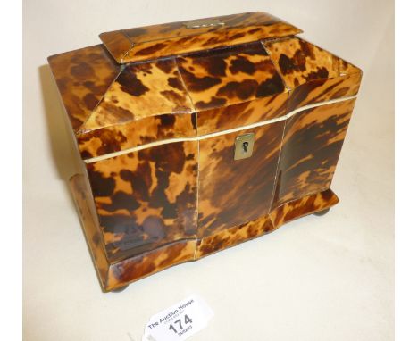 English Regency tortoiseshell double compartment tea caddy with pagoda top and standing on ball feet, approx. 13.5cm high