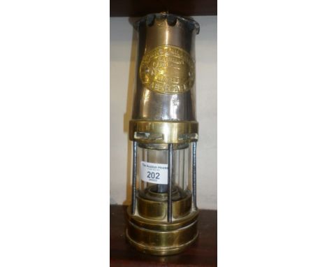 Brass and steel Miners lamp by Thomas &amp; Williams of Aberdare. 11" tall