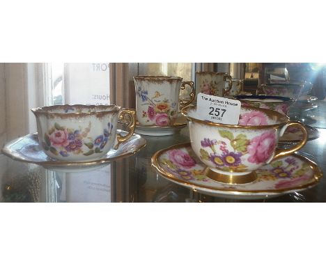 Four various bone china cabinet cups and saucers