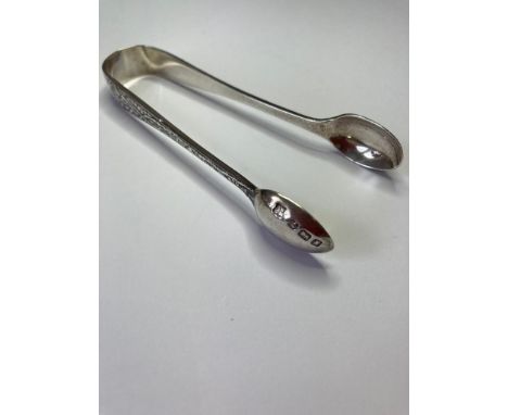 Antique pair of Silver SUGAR TONGS, having clear hallmark for Henry Wilkinson.  Sheffield 1890.  Intricate design work to out