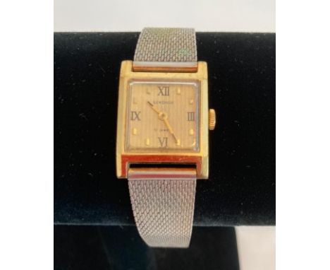 Vintage Sekonda wristwatch. Having square face and silver and gold tones. Mid-size, suitable for ladies and gents. Original R