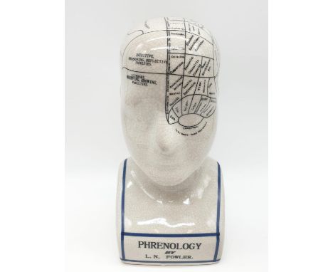 A PHRENOLOGY ceramic bust with detailed mapping of the various areas of the cranial area. By L. N. Fowler. Dimensions: 23 x 1