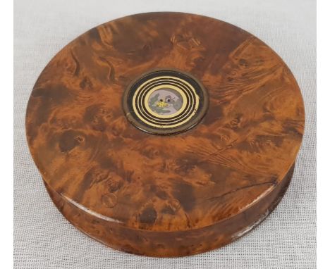 An Antique Walnut Ladies Compact, with gilded centre.8cm diameter. 