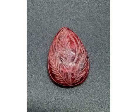 A 106.75ct Carved Ruby. 21.3g. 3cm 