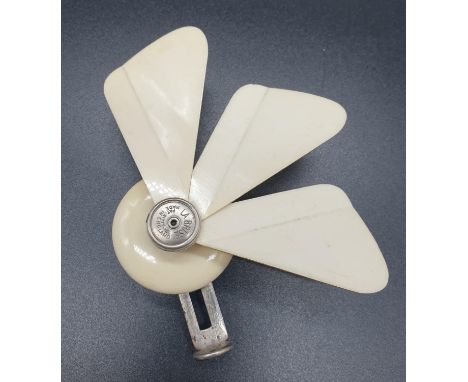A Vintage La Brise fan.  A Folding mechanical ladies handbag fan.  In working order.   12cm diameter. 