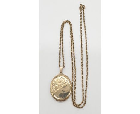 9ct gold vintage locket on a 9ct gold 60cm long chain, weight 10.71g 