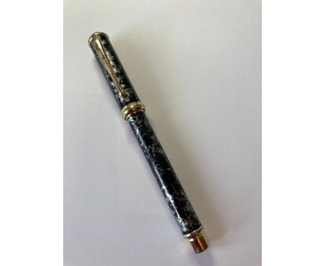 Vintage Ultimo FOUNTAIN PEN having a black and silver pattern to the case.  Cartridge loading. 