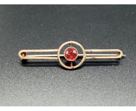 Vintage 9ct Yellow Gold BAR BROOCH with a Red Stone centre.  1.8g   4.4 cm long. 