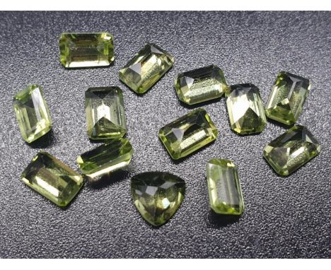 9 Cts assorted PERIDOT GEMSTONES. Rectangular step cut, Calibrated