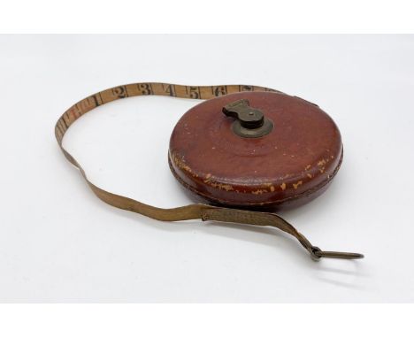 A John Rabone and Sons vintage leather cased surveyors tape measure. 