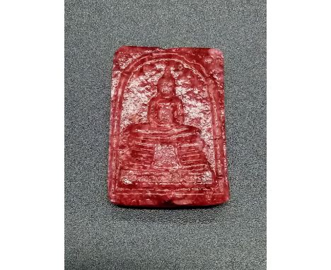 A 47.95ct Ruby Carved Buddha. 3cm