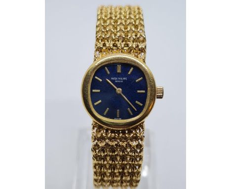 Vintage Patek Philippe Geneve Ladies 18ct Gold Wrist WATCH. with blue face and solid Gold strap.   52.9g.  17cm long 