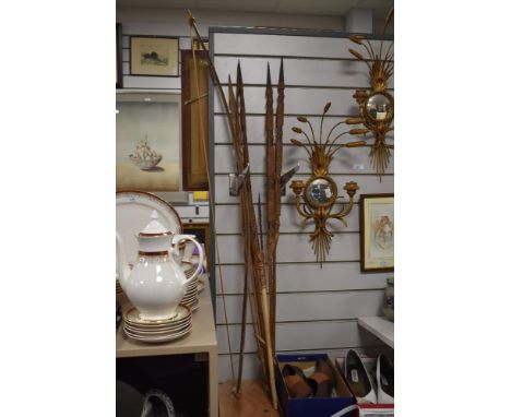A native American tribal bow and three pronged arrow and five ceremonial spears.