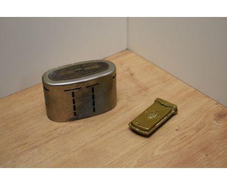 A vintage District Bank money box and a Victorian brass needle case.