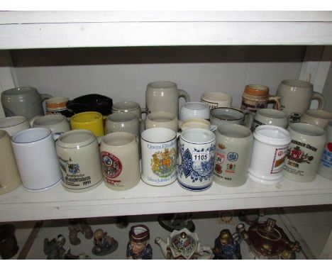 A large quantity of ceramic tankards