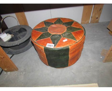 A leather pouffe