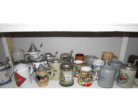 A large quantity of ceramic tankards and beer steins