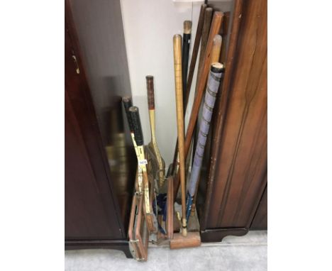 Vintage croquet mallets  and tennis rakcets in cases etc