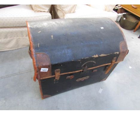 A large domed trunk with shelf