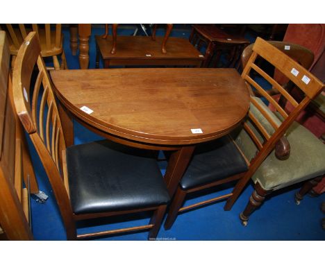 A flap over semi circular side table, 35 1/2" x 17 5/8" extending to 35 1/2" x 30" high. together with a pair of black seated