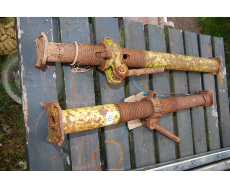 Two adjustable acro props.
