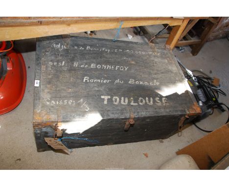 A metal bound  wooden trunk, 38'' wide x 24'' deep x 17'' high.