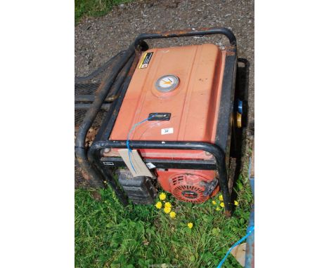 A petrol engined (labelled GX 200 6.5 hp)generator with long-run fuel tank - engine turns.