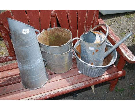 A galvanized coal scuttle, buckets, watering can, planter etc.