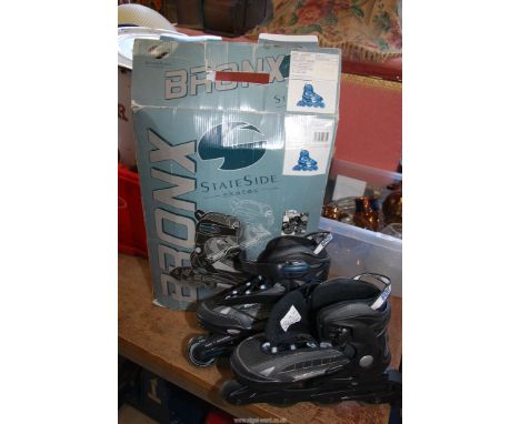 A pair of Roller Boots UK 4-7