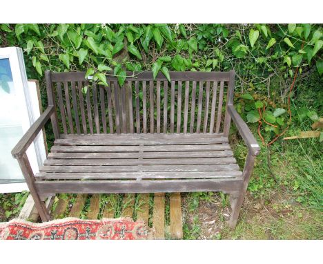 A slatted garden bench, 4' wide x 34" high.