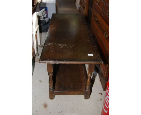 A coffee table with lower shelf, 47" x 18" x 18" high.