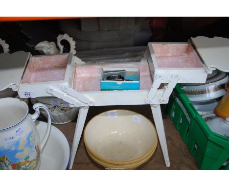 A wash basin and jug, cantilever sewing box,  two jardinieres, two ornamental jugs.