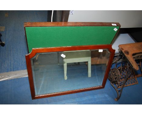 A Mahogany framed, baize topped card table and a Mahogany framed beveled wall mirror.