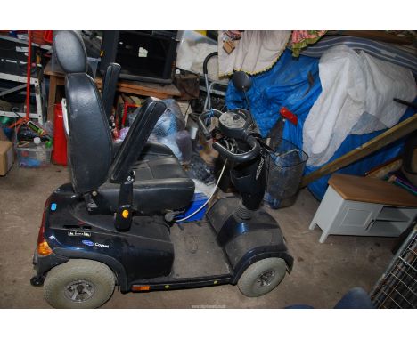An "Invacare" Comet mobility Scooter, with charger, (needs a battery) 