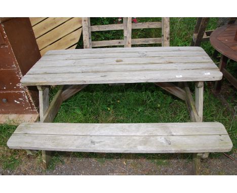 A picnic bench, 55" wide x 25 1/2" high x 50" depth.