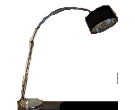 A large arc floor standing lamp, black shade